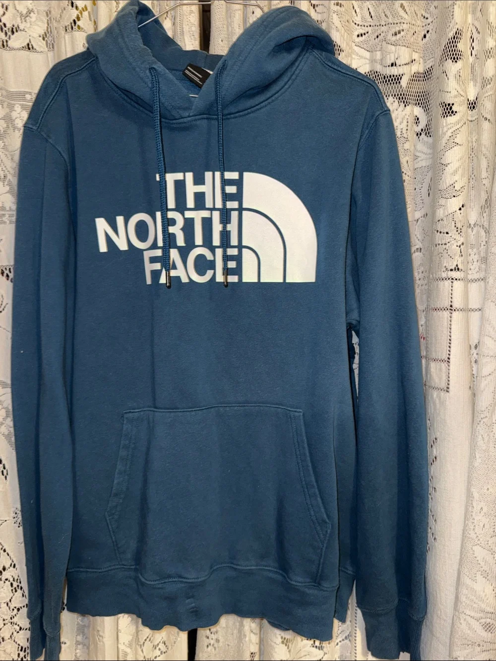 The North Face Blue Hoodie with White Logo